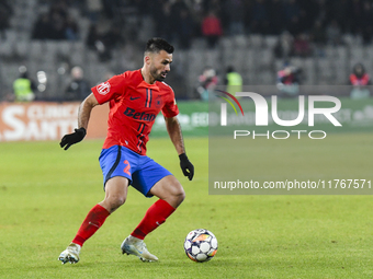 Valentin Cretu is in action during the Superliga match between Universitatea Cluj and FCSB at Cluj Arena in Cluj, Romania, on November 10, 2...