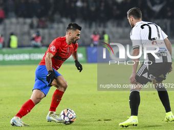 Valentin Cretu is in action during the Superliga match between Universitatea Cluj and FCSB at Cluj Arena in Cluj, Romania, on November 10, 2...