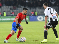 Valentin Cretu is in action during the Superliga match between Universitatea Cluj and FCSB at Cluj Arena in Cluj, Romania, on November 10, 2...