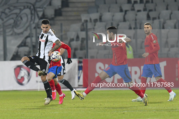 Ovidiu Bic is in action during the Superliga match between Universitatea Cluj and FCSB at Cluj Arena in Cluj, Romania, on November 10, 2024....