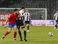 Vladislav Blanuta and Mihai Popescu are in action during the Superliga match between Universitatea Cluj and FCSB at Cluj Arena in Cluj, Roma...