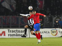 Daniel Birligea and Lucas Gabriel MASOERO are in action during the Superliga match between Universitatea Cluj and FCSB at Cluj Arena in Cluj...