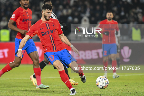 Mihai Popescu is in action during the Superliga match between Universitatea Cluj and FCSB at Cluj Arena in Cluj, Romania, on November 10, 20...