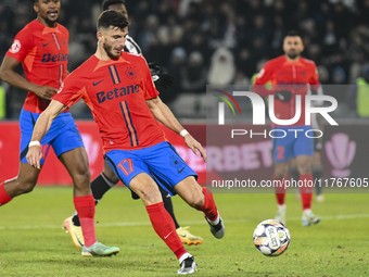 Mihai Popescu is in action during the Superliga match between Universitatea Cluj and FCSB at Cluj Arena in Cluj, Romania, on November 10, 20...