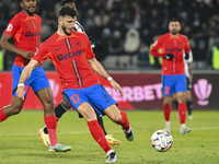 Mihai Popescu is in action during the Superliga match between Universitatea Cluj and FCSB at Cluj Arena in Cluj, Romania, on November 10, 20...