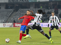 Daniel Birligea and Franck TCHASSEM are in action during the Superliga match between Universitatea Cluj and FCSB at Cluj Arena in Cluj, Roma...