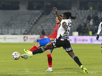 Daniel Birligea and Franck TCHASSEM are in action during the Superliga match between Universitatea Cluj and FCSB at Cluj Arena in Cluj, Roma...