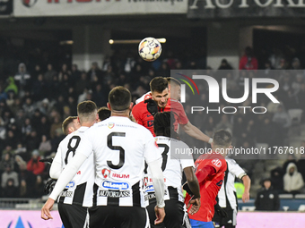 Mihai Popescu is in action during the Superliga match between Universitatea Cluj and FCSB at Cluj Arena in Cluj, Romania, on November 10, 20...