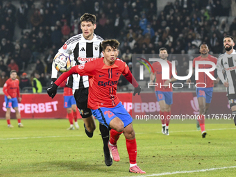 Vladislav Blanuta and Alexandru Musi are in action during the Superliga match between Universitatea Cluj and FCSB at Cluj Arena in Cluj, Rom...