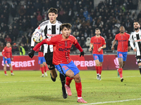 Vladislav Blanuta and Alexandru Musi are in action during the Superliga match between Universitatea Cluj and FCSB at Cluj Arena in Cluj, Rom...