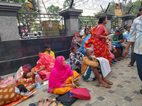 Patient relatives sit inside a government-run hospital in Kolkata, India, on November 11, 2024. (