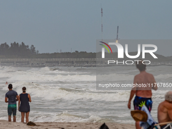 A common scene now occurs in Cape Canaveral. Beachgoers watch the landing of a SpaceX rocket first stage after it launches the satellite Kor...