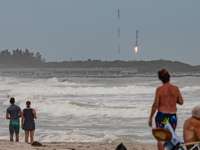 A common scene now occurs in Cape Canaveral. Beachgoers watch the landing of a SpaceX rocket first stage after it launches the satellite Kor...