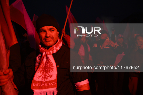 People take part in the 106th anniversary of Poland regaining its independence in Warsaw, Poland, on November 11, 2023. Thousands of people...