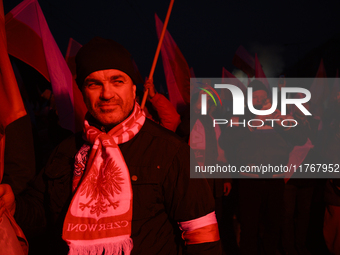 People take part in the 106th anniversary of Poland regaining its independence in Warsaw, Poland, on November 11, 2023. Thousands of people...