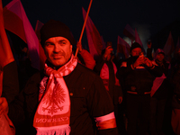 People take part in the 106th anniversary of Poland regaining its independence in Warsaw, Poland, on November 11, 2023. Thousands of people...