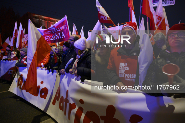 People take part in the 106th anniversary of Poland regaining its independence in Warsaw, Poland, on November 11, 2023. Thousands of people...