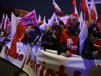 People take part in the 106th anniversary of Poland regaining its independence in Warsaw, Poland, on November 11, 2023. Thousands of people...