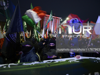 Members of Italian and Polish far-right groups wave flags as they participate in the 106th anniversary of Poland regaining its independence...