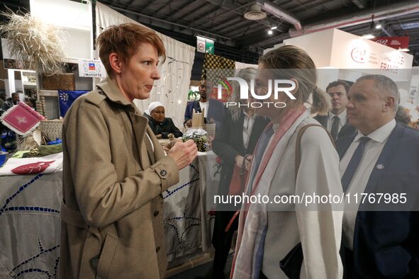 French Minister of Labor and Employment Astrid Panosyan-Bouvet (R) speaks with French journalist Natacha Polony (L) as she visits the ''Made...