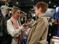 French Minister of Labor and Employment Astrid Panosyan-Bouvet (R) speaks with French journalist Natacha Polony (L) as she visits the ''Made...