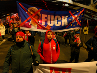 Paricitpants carry an anti-EU banner featuring an effigy of European Commission President Ursula Von Der Leyen in Warsaw, Poland on 11 Novem...