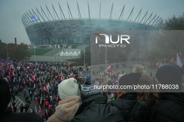 Crowds are seen in front of the National Stadium in Warsaw, Poland on 11 November, 2024. A march organized by far-right, nationalist organiz...