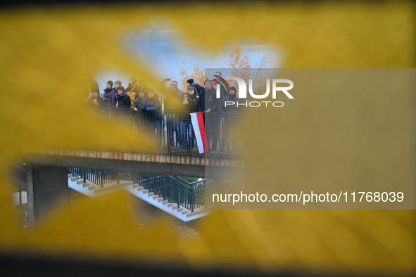 People take part in marking the 106th independence celebration in Warsaw, Poland on 11 November, 2024. A march organized by far-right, natio...