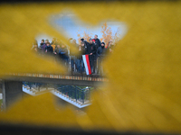 People take part in marking the 106th independence celebration in Warsaw, Poland on 11 November, 2024. A march organized by far-right, natio...