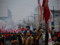 People take part in marking the 106th independence celebration in Warsaw, Poland on 11 November, 2024. A march organized by far-right, natio...