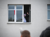 A man wearing a mask with a effigy of politician Grzegorz Braun waves in Warsaw, Poland on 11 November, 2024. A march organized by far-right...