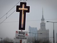 A cross is seen during the Independence Day march in Warsaw, Poland on 11 November, 2024. A march organized by far-right, nationalist organi...