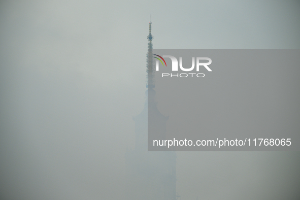 The Palace of Culture is seen behing a wall of smoke for flares in Warsaw, Poland on 11 November, 2024. A march organized by far-right, nati...