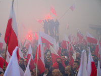 People take part in marking the 106th independence celebration in Warsaw, Poland on 11 November, 2024. A march organized by far-right, natio...