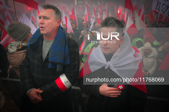 People take part in marking the 106th independence celebration in Warsaw, Poland on 11 November, 2024. A march organized by far-right, natio...