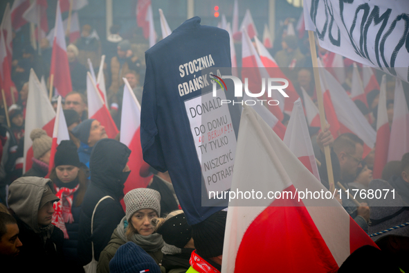 People take part in marking the 106th independence celebration in Warsaw, Poland on 11 November, 2024. A march organized by far-right, natio...