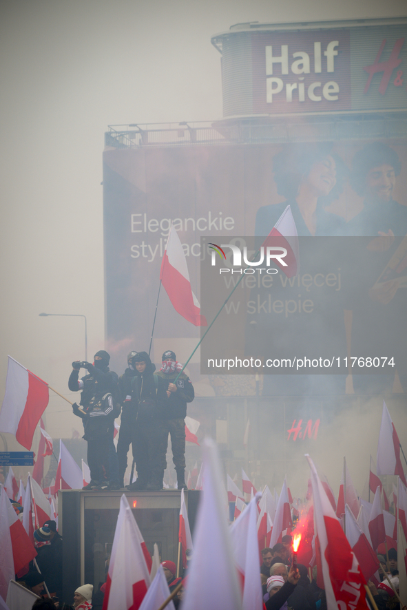 People take part in marking the 106th independence celebration in Warsaw, Poland on 11 November, 2024. A march organized by far-right, natio...