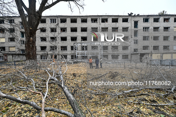 A hostel where internally displaced persons live is damaged by an overnight Russian air strike in Zaporizhzhia, Ukraine, on November 11, 202...