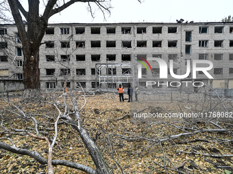 A hostel where internally displaced persons live is damaged by an overnight Russian air strike in Zaporizhzhia, Ukraine, on November 11, 202...