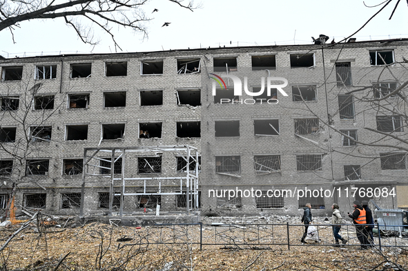 A hostel where internally displaced persons live is damaged by an overnight Russian air strike in Zaporizhzhia, Ukraine, on November 11, 202...