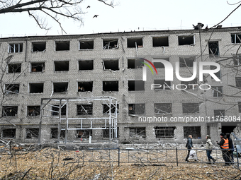 A hostel where internally displaced persons live is damaged by an overnight Russian air strike in Zaporizhzhia, Ukraine, on November 11, 202...