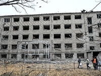 A hostel where internally displaced persons live is damaged by an overnight Russian air strike in Zaporizhzhia, Ukraine, on November 11, 202...