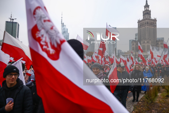 People attend Independence March celebrating the 106 anniversary of Poland regaining independence. Warsaw, Poland on 11 November, 2024. Tens...