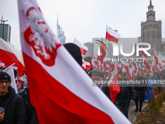 People attend Independence March celebrating the 106 anniversary of Poland regaining independence. Warsaw, Poland on 11 November, 2024. Tens...