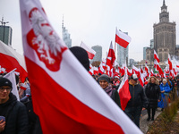 People attend Independence March celebrating the 106 anniversary of Poland regaining independence. Warsaw, Poland on 11 November, 2024. Tens...