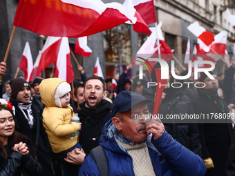 People attend Independence March celebrating the 106 anniversary of Poland regaining independence. Warsaw, Poland on 11 November, 2024. Tens...