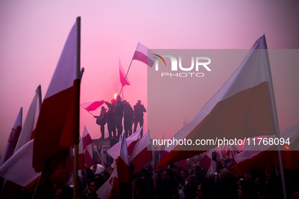 People attend Independence March celebrating the 106 anniversary of Poland regaining independence. Warsaw, Poland on 11 November, 2024. Tens...