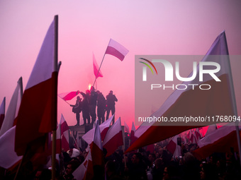 People attend Independence March celebrating the 106 anniversary of Poland regaining independence. Warsaw, Poland on 11 November, 2024. Tens...