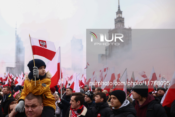 People attend Independence March celebrating the 106 anniversary of Poland regaining independence. Warsaw, Poland on 11 November, 2024. Tens...