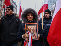 People attend Independence March celebrating the 106 anniversary of Poland regaining independence. Warsaw, Poland on 11 November, 2024. Tens...